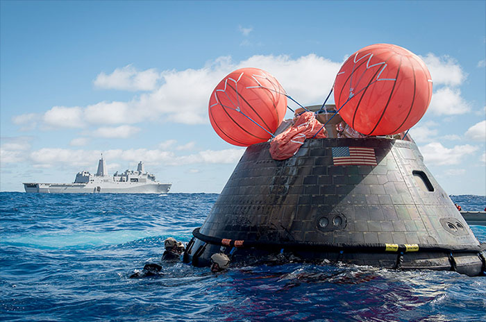 NASA's Orion spacecraft safely splashed down in the Pacific Ocean in December 2014. ARDÉ tanks helped inflate the water flotation devices which is used if the capsule needs uprighting. Photo Credit: U.S. Navy / Gary Keen