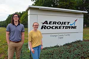 Harrison J. and Daphne S., two of the college students that AR recently hired as former interns, standing in front of the AR Orange, Virginia site sign.