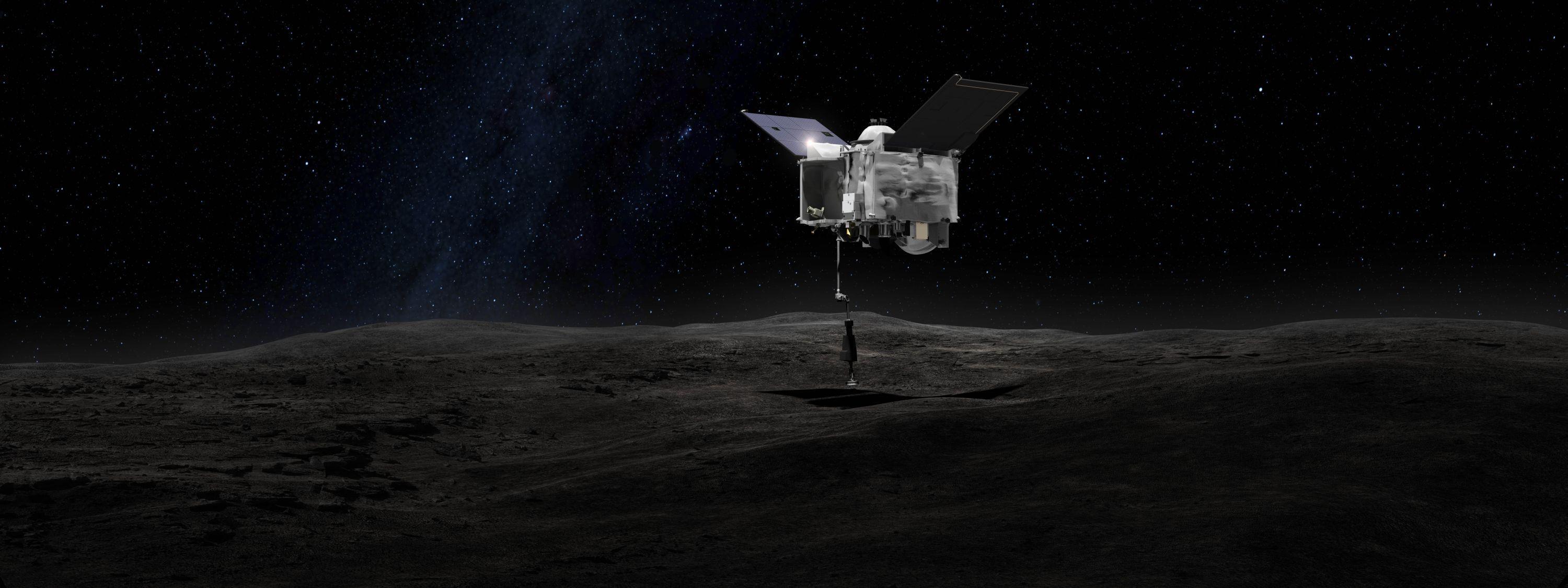 OSIRIS-REx contacts the asteroid Bennu with the Touch-And-Go Sample Arm Mechanism or TAGSAM. Credit: NASA