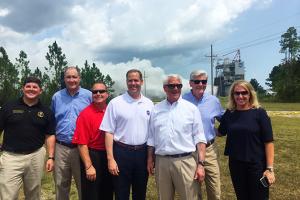 At RS-25 engine test at NASA's Stennis Space Center 8/14/18: U.S. Rep. Steven Palazzo; U.S. Rep. Trent Kelly; Stennis Dir Richard Gilbrech; NASA Admin Jim Bridenstine; U.S. Senator Roger Wicker; Miss. Gov. Phil Bryant; and AR CEO & Pres Eileen Drake