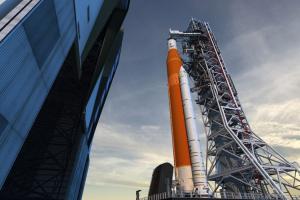 Artist rendition of NASA's Block 1 Space Launch System on the launch pad at sunset. Image courtesy of NASA.