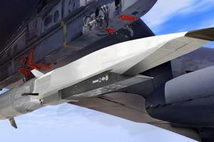 An artist's rendition of an X-51A WaveRider (in white) attached to the wing of a B-52.
